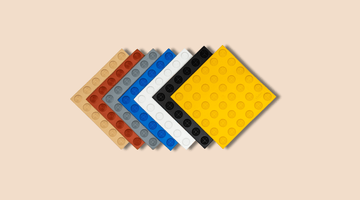 tactile indicator tiles in multiple colors used for accessibility guidance in public walkways