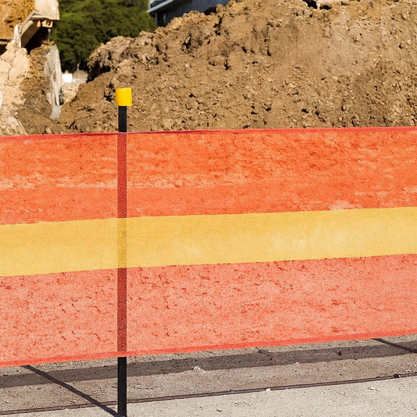 The open "onion bag" mesh pattern allows airflow to pass through easily, significantly reducing the risk of the fence being knocked over or "sailing" in high-wind conditions compared to solid plastic barriers.