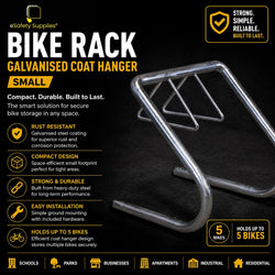 A galvanised steel Coat Hanger Bike Rack designed to hold up to 5 bicycles, shown bolted to the ground as a compact storage solution for offices or apartments.