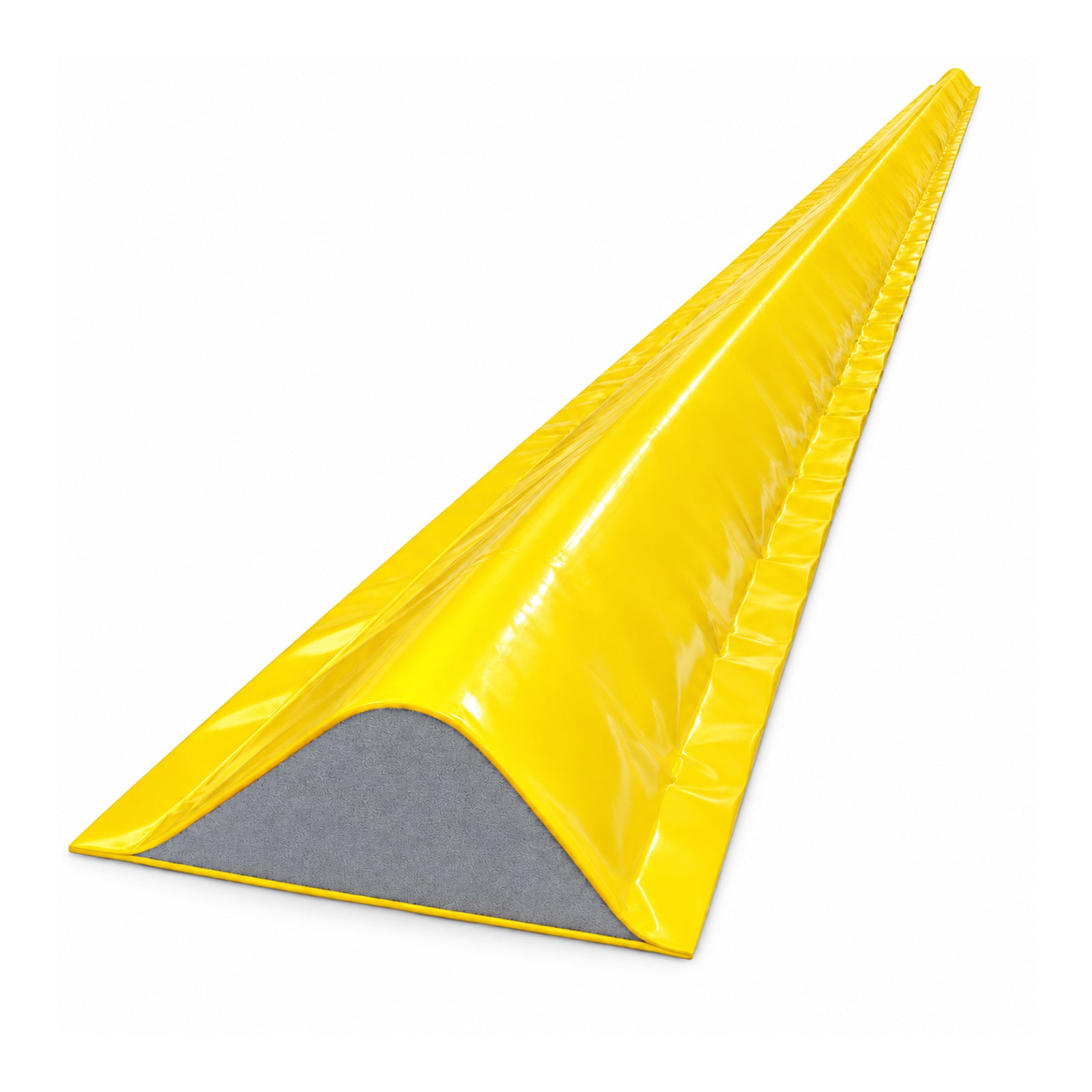 High-visibility yellow PVC-coated foam core drive-over bunding kit laid across a warehouse roller door threshold for spill containment.