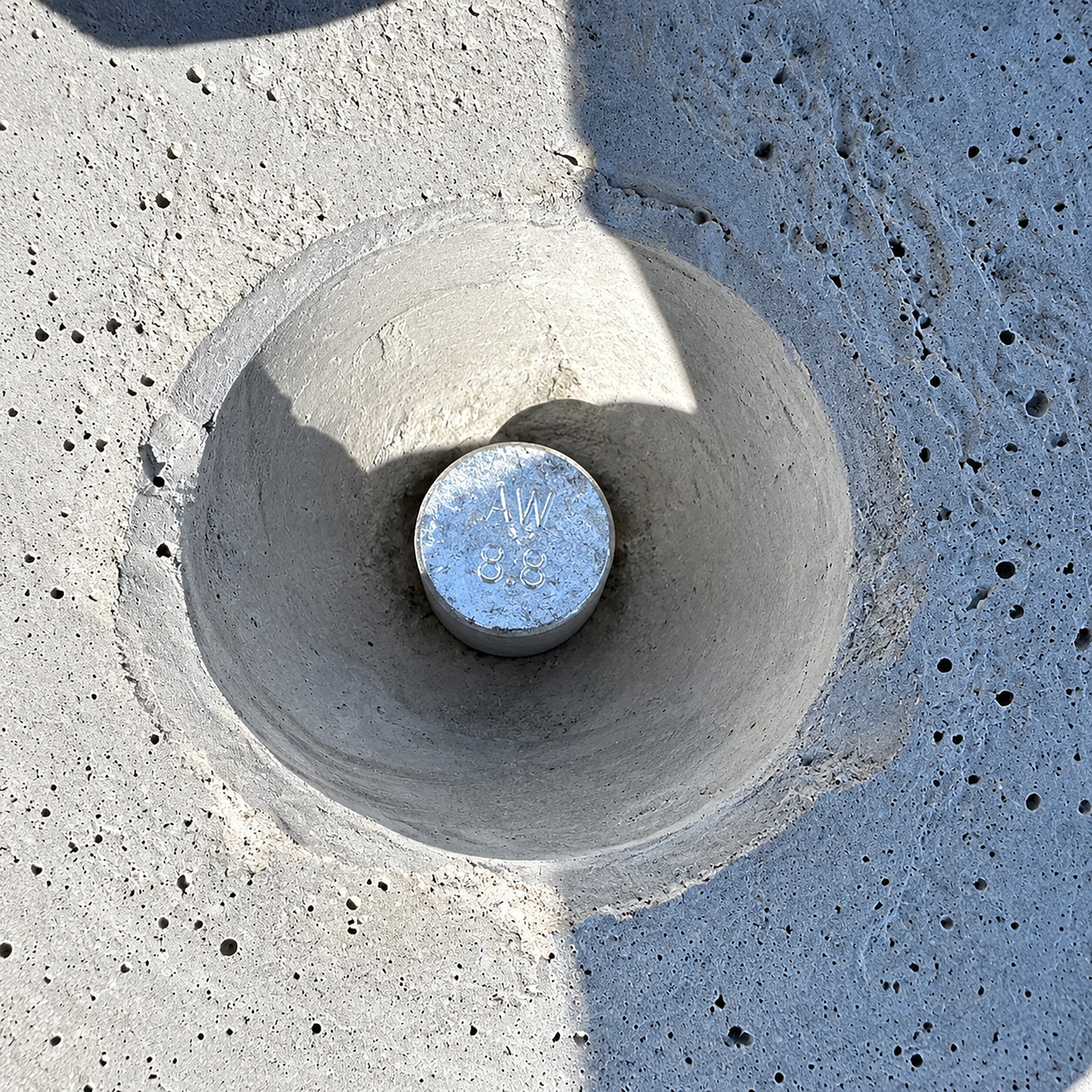 3-metre precast concrete Jersey barrier featuring tapered male and female interlocking ends, drainage cutouts, and a Class 3 off-form finish.