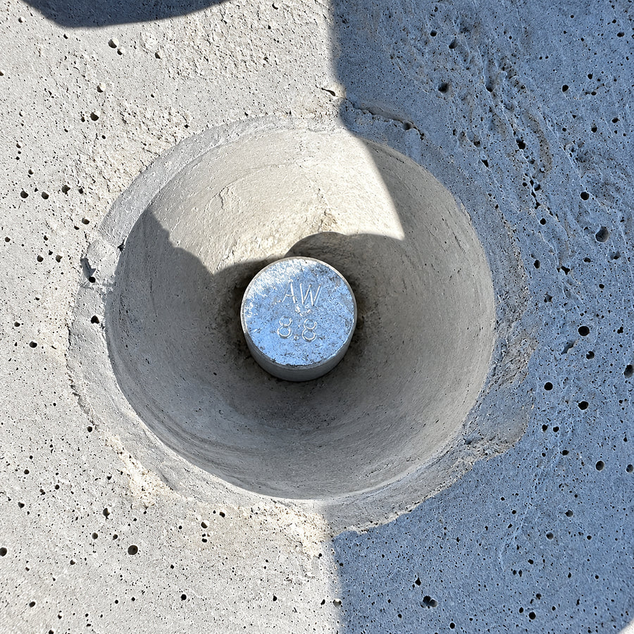 3-metre precast concrete Jersey barrier featuring tapered male and female interlocking ends, drainage cutouts, and a Class 3 off-form finish.