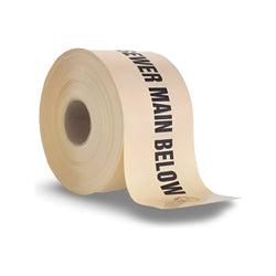 A roll of beige mains marker tape with text 'MAIN BELOW' printed on it, used for indicating the presence of buried sewer mains.