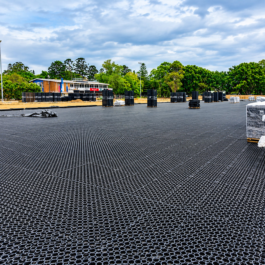 Heavy-duty 50mm black plastic interlocking grass paver panel designed for gravel or turf stabilization and driveway support.