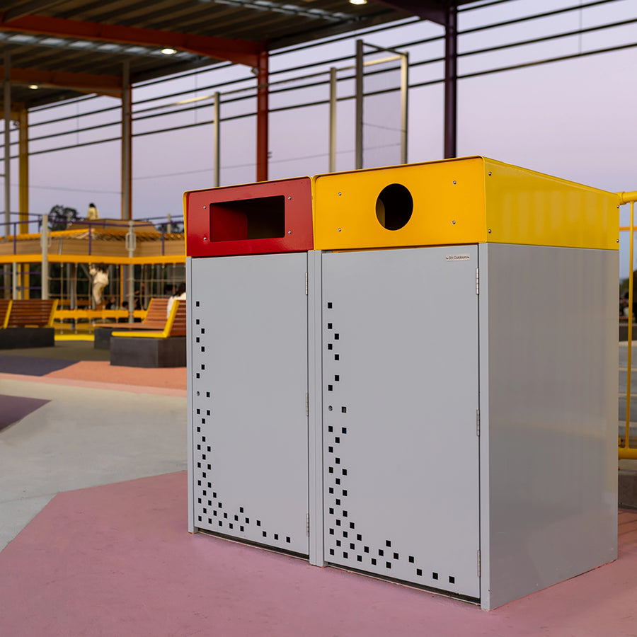 Powdercoated zinc steel 120L wheelie bin enclosure featuring a top waste opening, lockable hinged front door, and bolt-down base.
