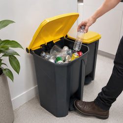 Plastic foot-operated pedal bin used for hygienic, hands-free waste disposal in kitchens, offices, and commercial facilities.