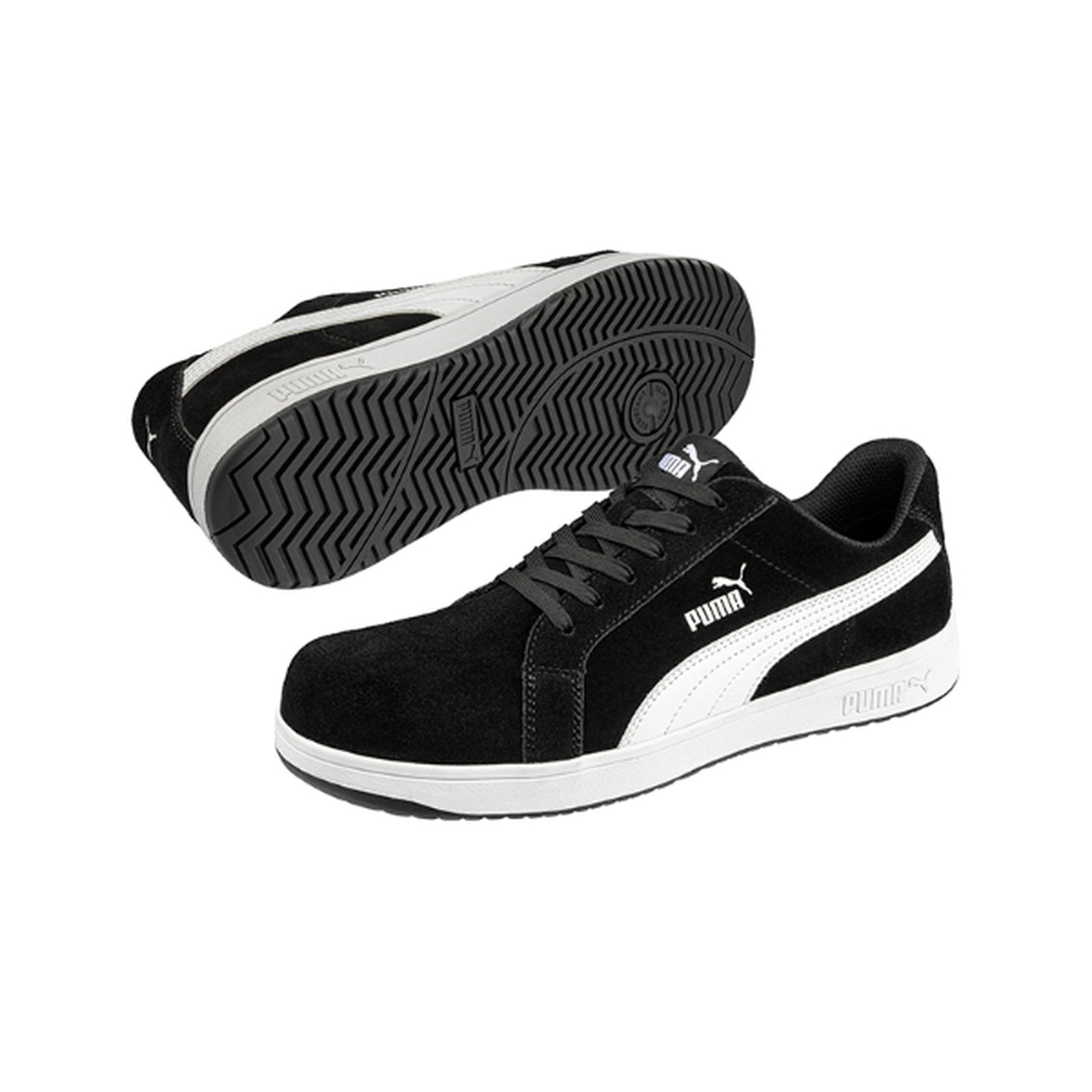 A pair of Puma Iconic Black and White Safety Sneaker in side and sole view.