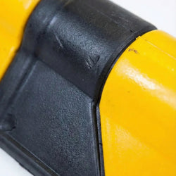 Close-up of a yellow and black tool handle