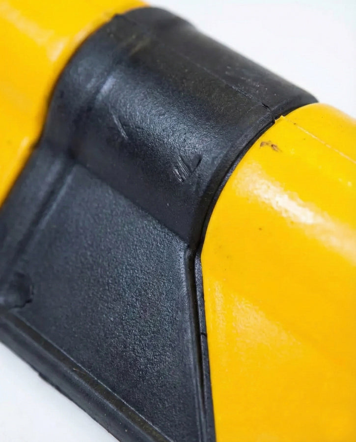 Close-up of a yellow and black tool handle