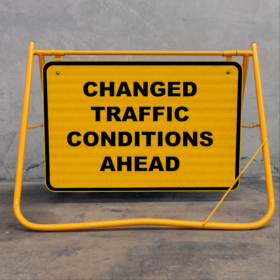 Flat-folding yellow swing stand sign frame for easy transport in site utes and vans, featuring a durable metal sign face and removable bolts.
