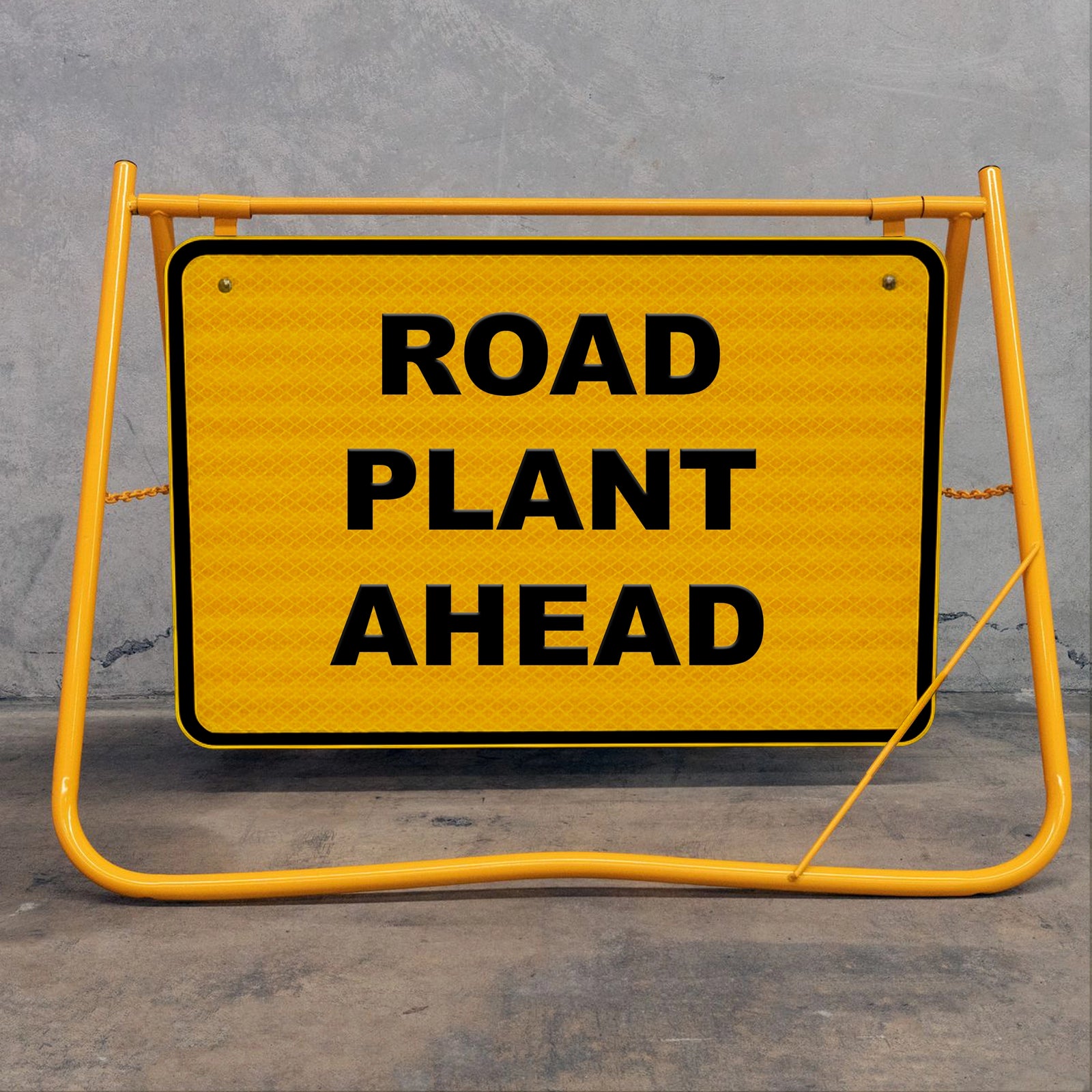 Flat-folding yellow swing stand sign frame for easy transport in construction utes and trucks, featuring a removable metal sign face for site versatility.