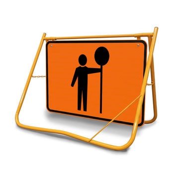 The bold orange face is specifically designed to stand out against urban and rural backgrounds, providing a clear visual cue that traffic management is in progress.
