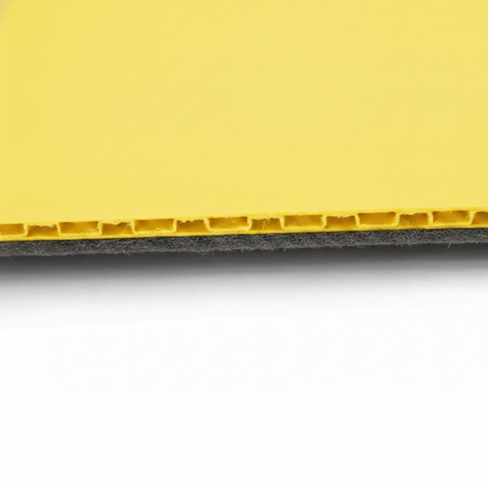 Close-up of the Shield Board Felt Backing, showing the heat-laminated underlay designed to protect polished timber and marble.