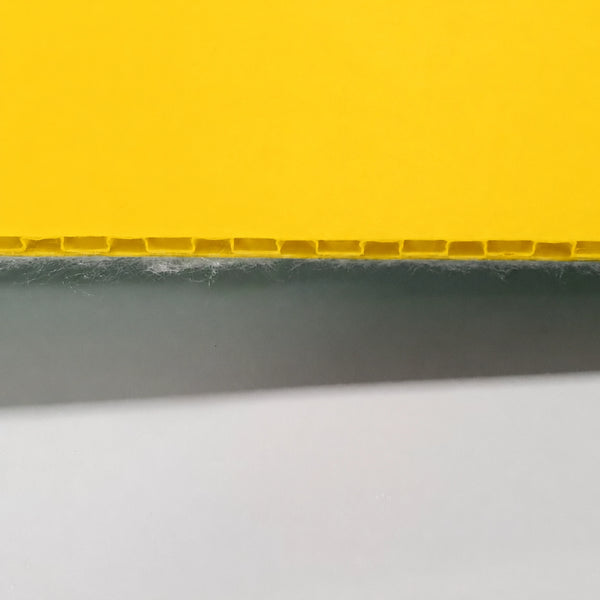 Heavy-Duty Protection Board laid out over a commercial tile floor, demonstrating a high-traction pedestrian walkway during a fit-out.