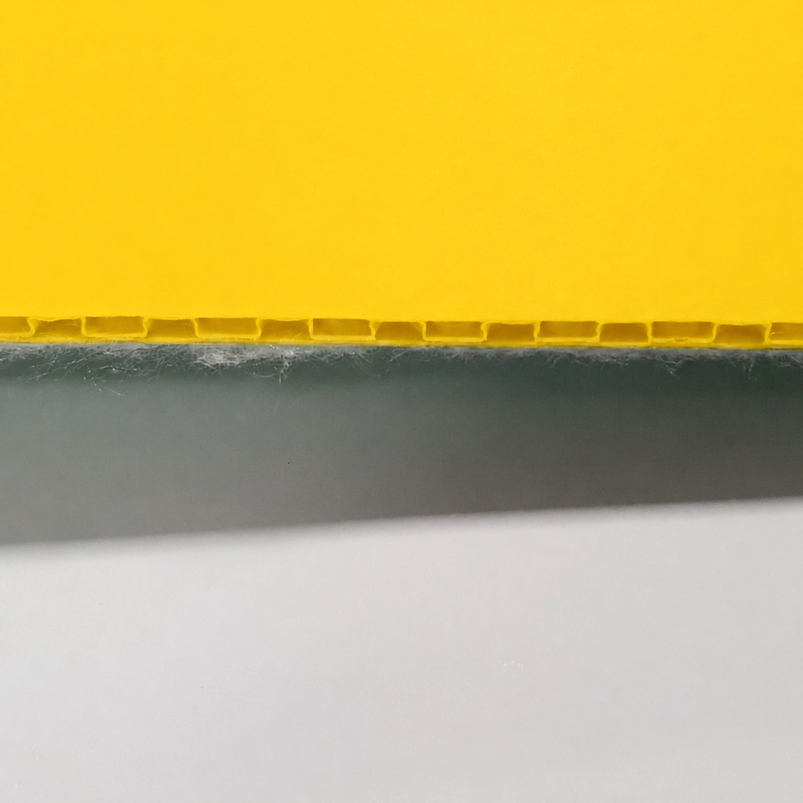 Heavy-Duty Protection Board laid out over a commercial tile floor, demonstrating a high-traction pedestrian walkway during a fit-out.