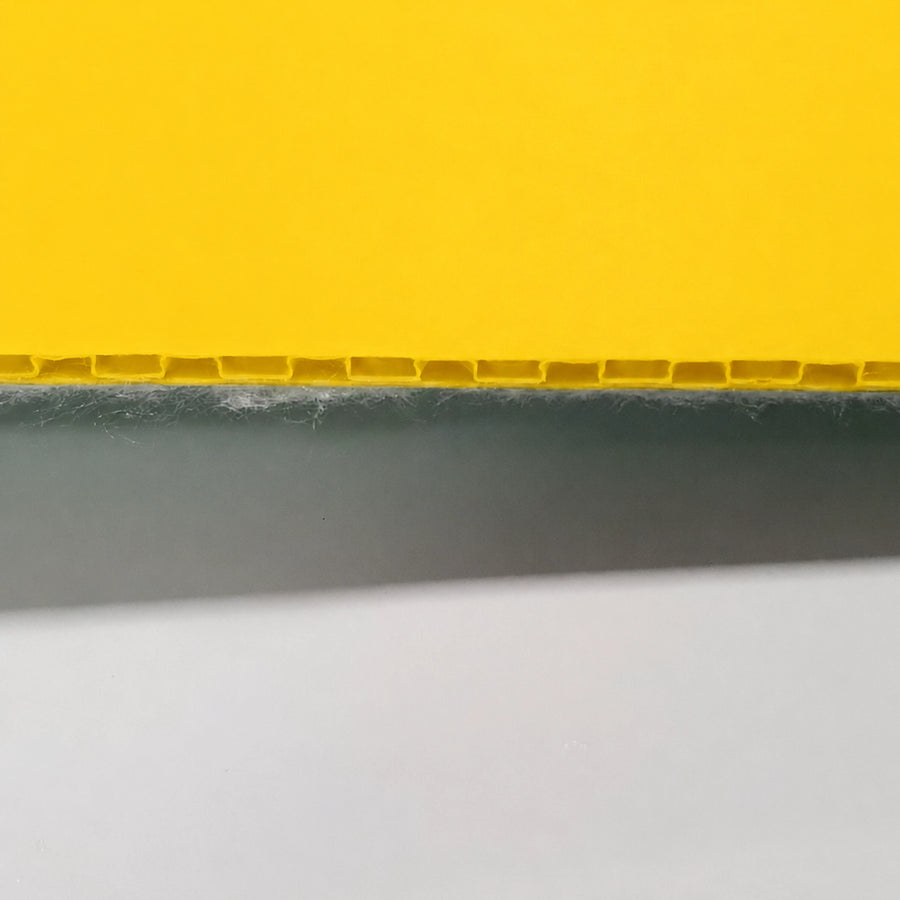 Heavy-Duty Protection Board laid out over a commercial tile floor, demonstrating a high-traction pedestrian walkway during a fit-out.