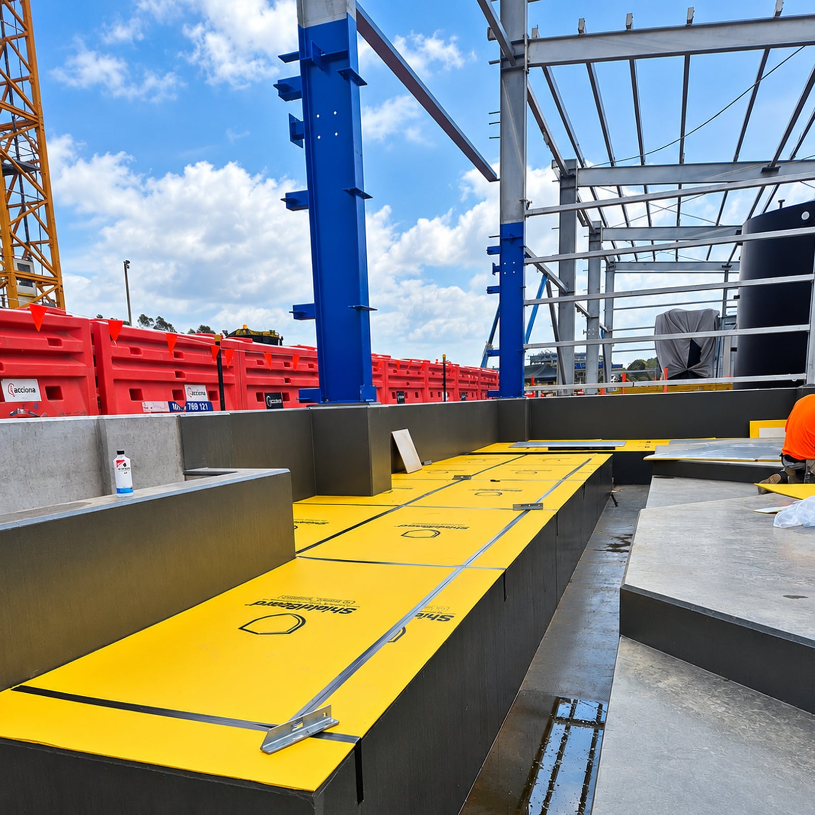 Heavy-duty yellow 2.2m x 1.2m x 5mm polypropylene floor protection board with a heat-laminated felt backing and textured anti-slip surface.