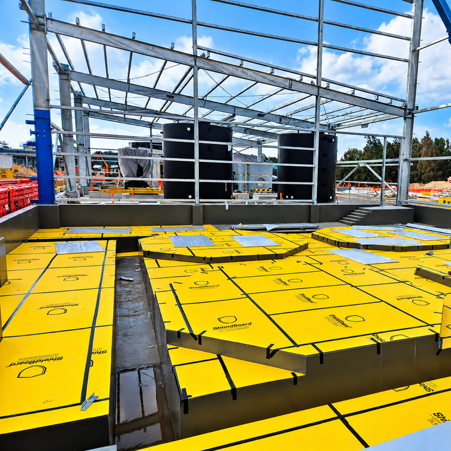 5mm thick yellow Shield Board with P4 slip rating showing the felt-laminated underlay for delicate surface protection.