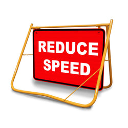 [Reduce Speed Swing Stand Sign], Class 1 reflective temporary traffic sign on a yellow powder-coated fold-flat frame.