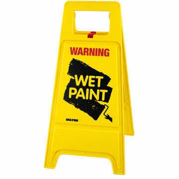 High-visibility yellow UNi-PRO A-frame warning sign with bold black "WET PAINT" text and a painter icon.