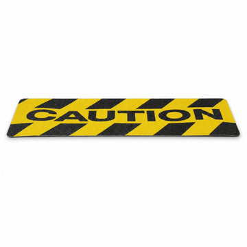 Caution mat with yellow and black stripes on a white background