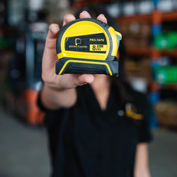 8-metre retractable steel tape measure with easy-to-read metric markings and durable locking mechanism for onsite renovations.